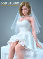 Animated character in a white wedding dress sitting on a white surface with a gray background.